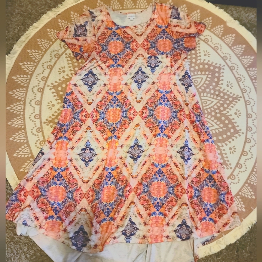 Like new Aztec print Lularoe Carly size medium